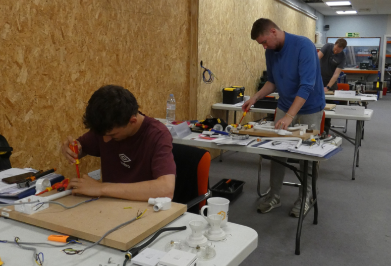 People investing in electrical training doing their City and Guilds course with PTT.