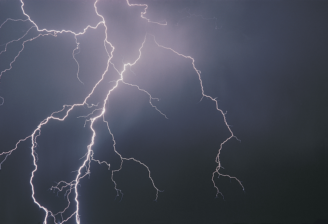 Lightning in the sky representing the importance of keeping people safe in these conditions