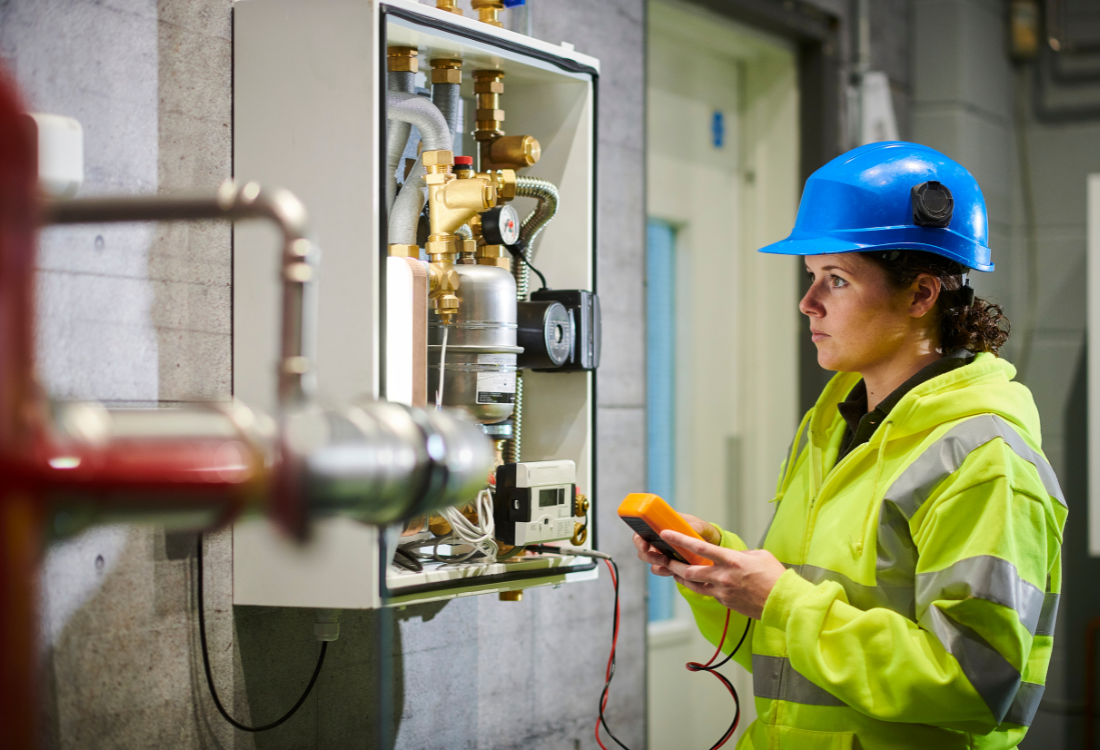 Woman in pratical training to become an electrician.